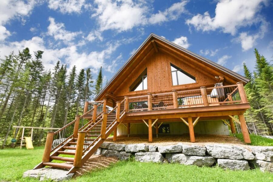 Chalet En Bois Rond / Le Draveur